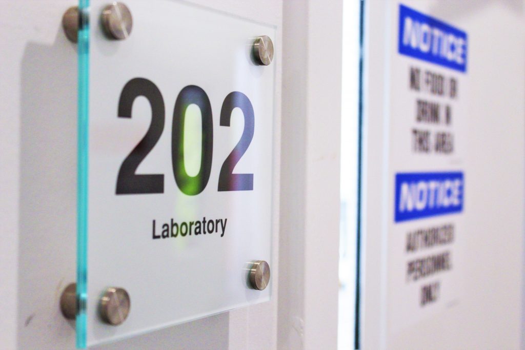 A close-up shot of a deutraMed™ lab door